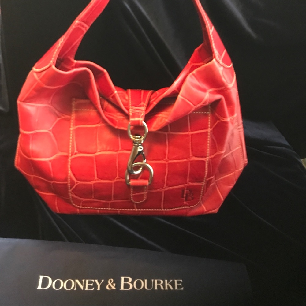 Dooney & Burke red handbag.